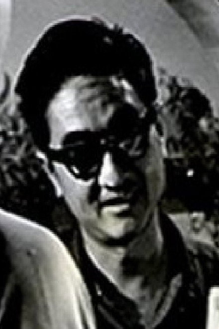 薛群